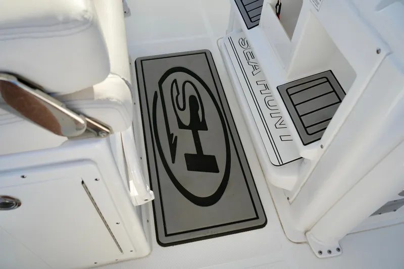 No Name 2024 30 Sea Hunt Yacht Photos Pics 2024 Sea Hunt 305 Ultra boat interior with branded mat and seating.