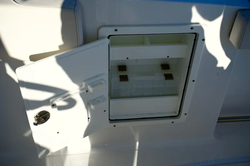 No Name 2024 30 Sea Hunt Yacht Photos Pics Open storage compartment on 2024 Sea Hunt 305 Ultra boat.