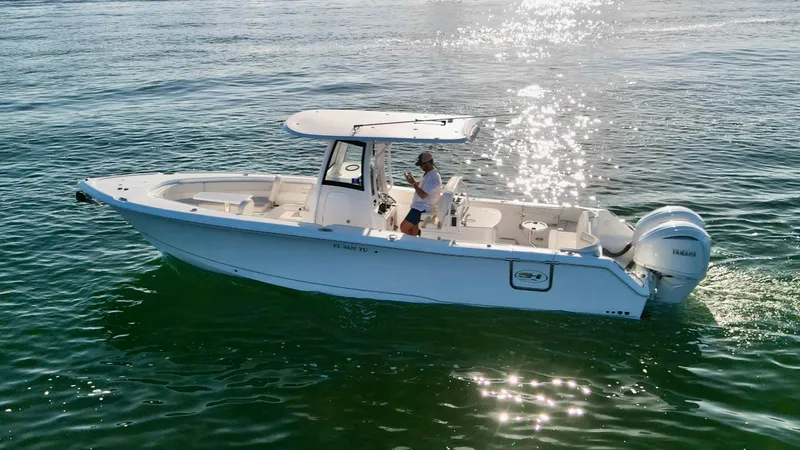 No Name 2024 30 Sea Hunt Yacht Photos Pics 2024 Sea Hunt 305 Ultra boat cruising on sparkling water.