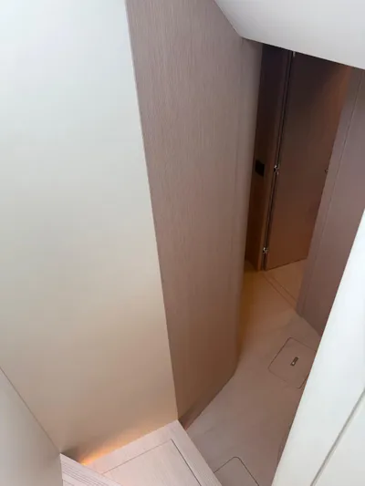  Yacht Photos Pics Interior hallway of 2025 Azimut Seadeck 6 yacht, featuring sleek modern design.