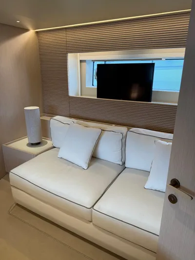  Yacht Photos Pics Luxurious interior of 2025 Azimut Seadeck 6 yacht with modern sofa and TV.