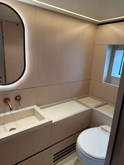  Yacht Photos Pics 2025 Azimut Seadeck 6 yacht bathroom with modern fixtures and minimalist design.