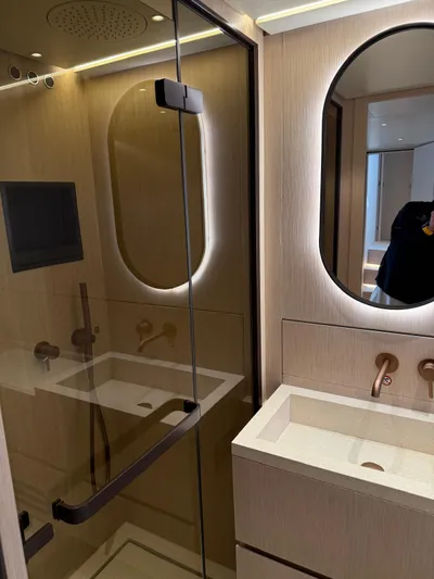  Yacht Photos Pics Luxurious bathroom in 2025 Azimut Seadeck 6 yacht with modern fixtures and elegant design.