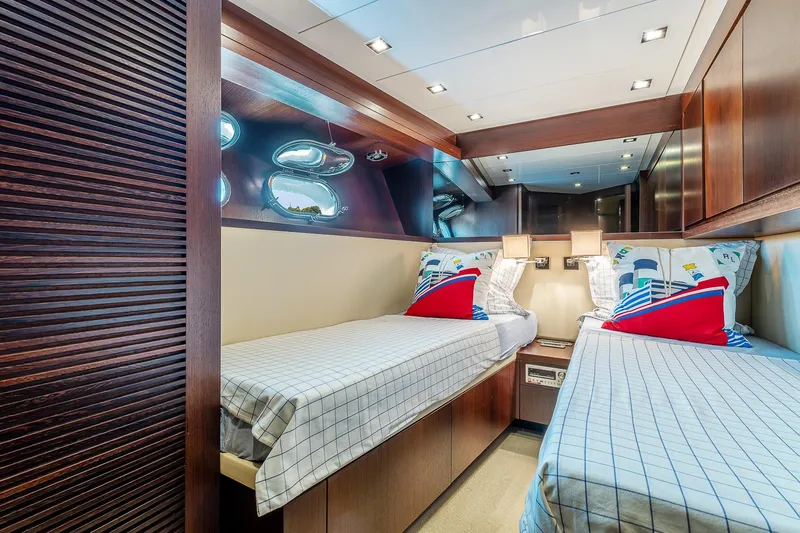 Easy Yacht Photos Pics Luxurious twin cabin interior of 2009 Sanlorenzo 82 yacht with modern design and elegant finishes.