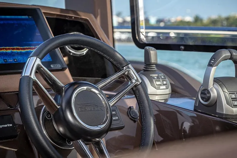  Yacht Photos Pics 2023 Galeon 425 HTS helm with steering wheel and control panel.