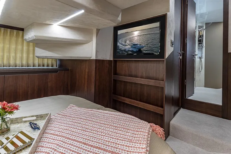  Yacht Photos Pics Luxurious interior of 2023 Galeon 425 HTS yacht with cozy bedroom and modern decor.