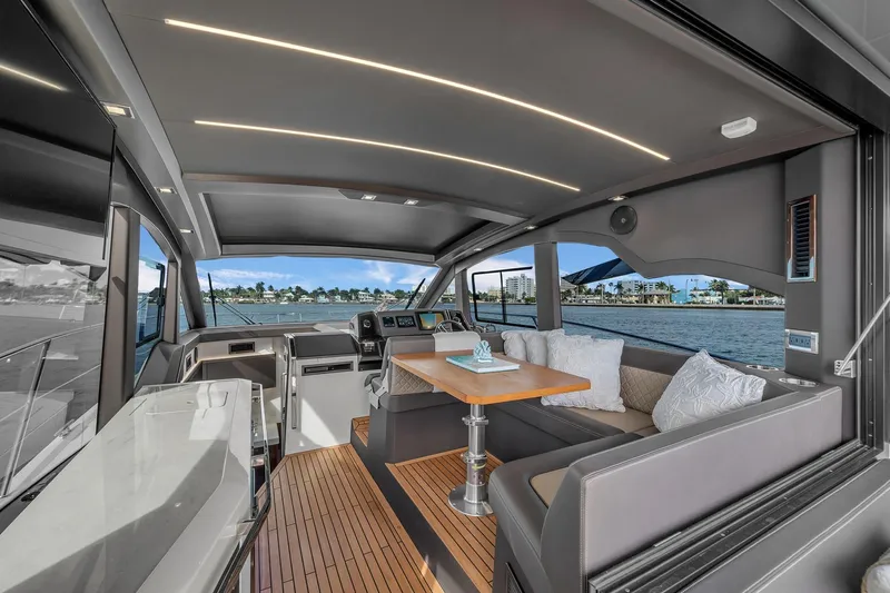  Yacht Photos Pics Luxurious interior of 2023 Galeon 425 HTS yacht with modern seating and scenic view.