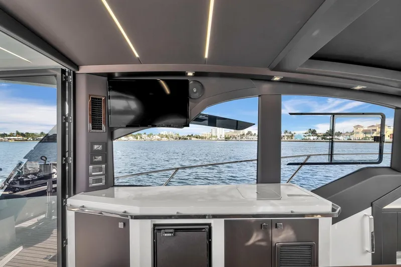  Yacht Photos Pics 2023 Galeon 425 HTS yacht interior with modern design and waterfront view.