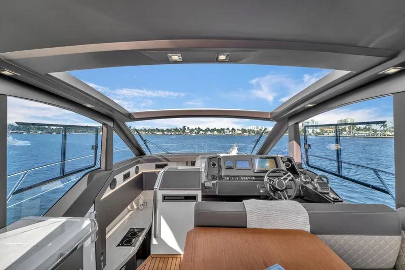  Yacht Photos Pics 2023 Galeon 425 HTS yacht interior with modern helm and panoramic ocean view.