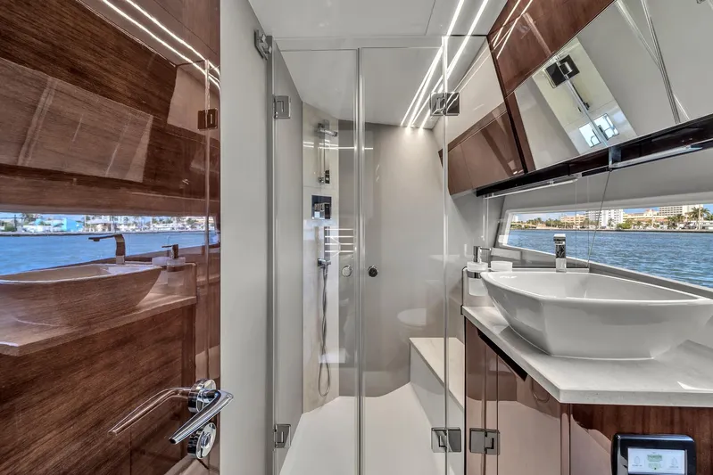  Yacht Photos Pics Luxurious bathroom interior of 2023 Galeon 425 HTS yacht with modern fixtures and elegant design.