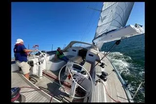 Sinfonie Sylt Yacht Photos Pics Sailing on a 2001 Grand Soleil 70 yacht with clear blue skies.