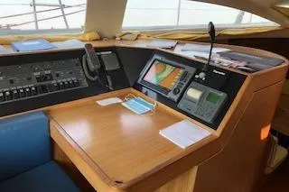 Sinfonie Sylt Yacht Photos Pics Navigation station of 2001 Grand Soleil 70 yacht with control panel and instruments.