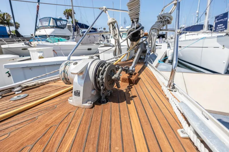 Roniin Yacht Photos Pics Deck of 2003 Hallberg-Rassy HR31 sailboat with anchor winch and ropes.