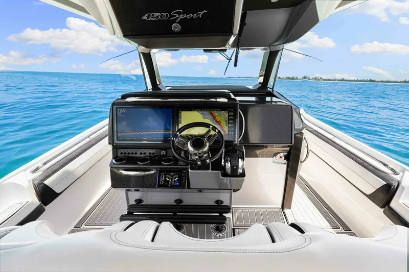 Rod's Jewel Yacht Photos Pics 2017 Nor-Tech 450SS boat cockpit with advanced navigation system on open water.