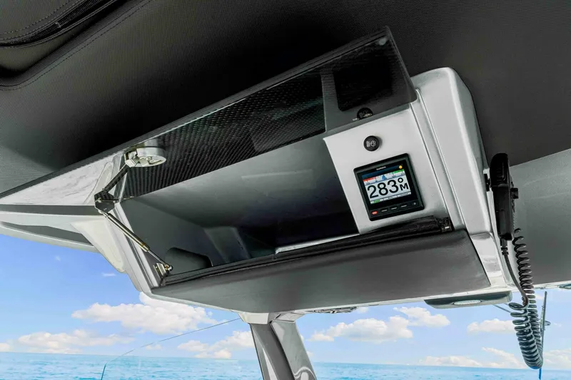Rod's Jewel Yacht Photos Pics 2017 Nor-Tech 450SS boat dashboard with digital display and ocean view.