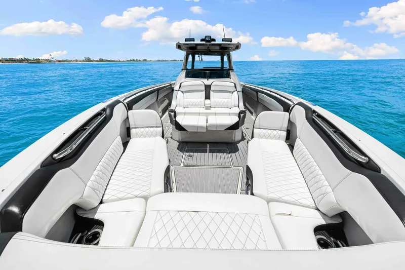 Rod's Jewel Yacht Photos Pics 2017 Nor-Tech 450SS luxury boat interior with white seating on open water.