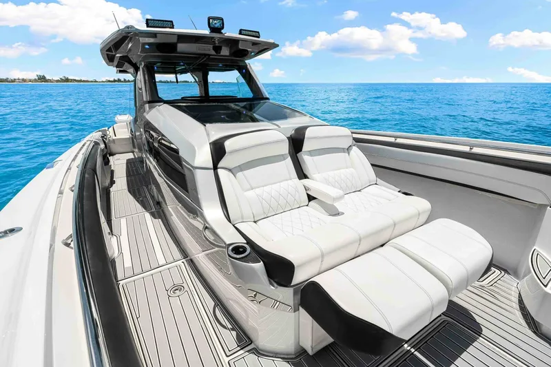 Rod's Jewel Yacht Photos Pics 2017 Nor-Tech 450SS luxury boat interior with plush seating on open water.