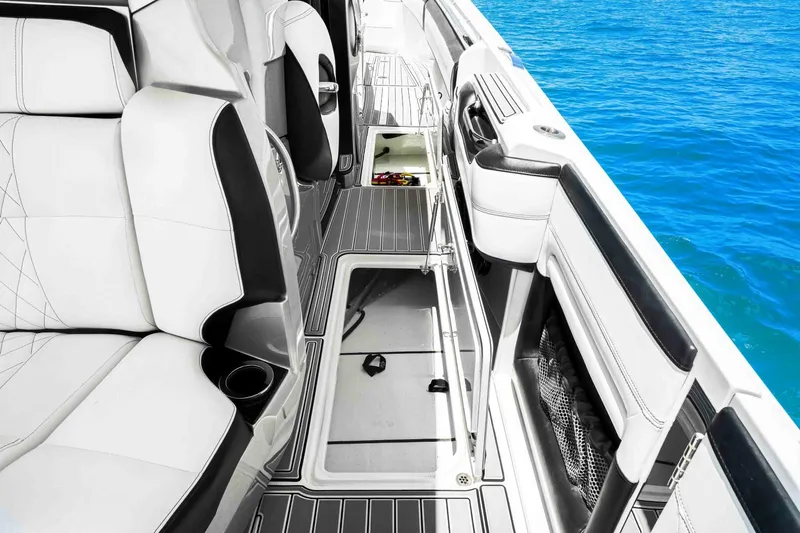 Rod's Jewel Yacht Photos Pics 2017 Nor-Tech 450SS boat interior with white seating and ocean view.