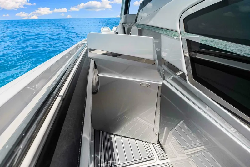 Rod's Jewel Yacht Photos Pics 2017 Nor-Tech 450SS boat interior with sleek design, stainless steel features, and ocean view.