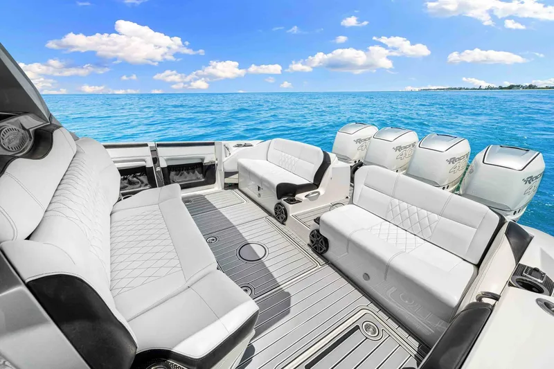 Rod's Jewel Yacht Photos Pics 2017 Nor-Tech 450SS boat interior with luxurious seating and powerful engines on open water.