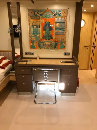  Yacht Photos Pics Luxurious yacht interior with elegant desk, vibrant artwork, and modern design elements. CNB 117, 2006.