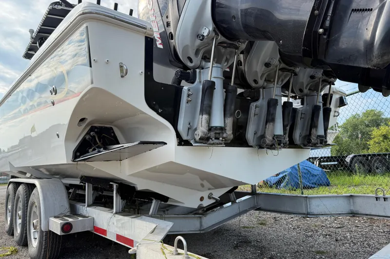  Yacht Photos Pics 2005 Fountain 34 Sportfish CC Open Bow on trailer, showcasing powerful outboard engines.