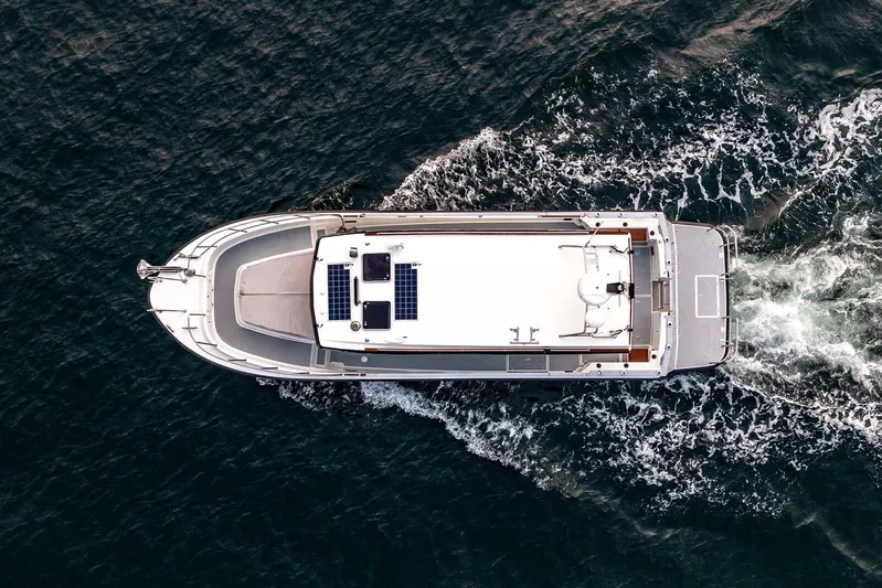  Yacht Photos Pics Aerial view of 2019 Targa 35 boat cruising on the ocean.
