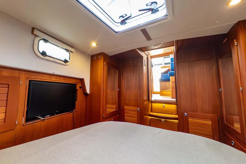  Yacht Photos Pics Luxurious interior of 2019 Targa 35 yacht with wood paneling and modern amenities.