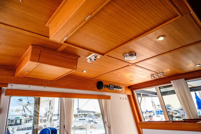 Yacht Photos Pics Interior of 2019 Targa 35 boat with wooden ceiling and modern lighting.