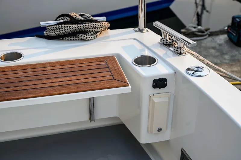  Yacht Photos Pics 2019 Targa 35 boat deck with wooden trim and mooring cleats.