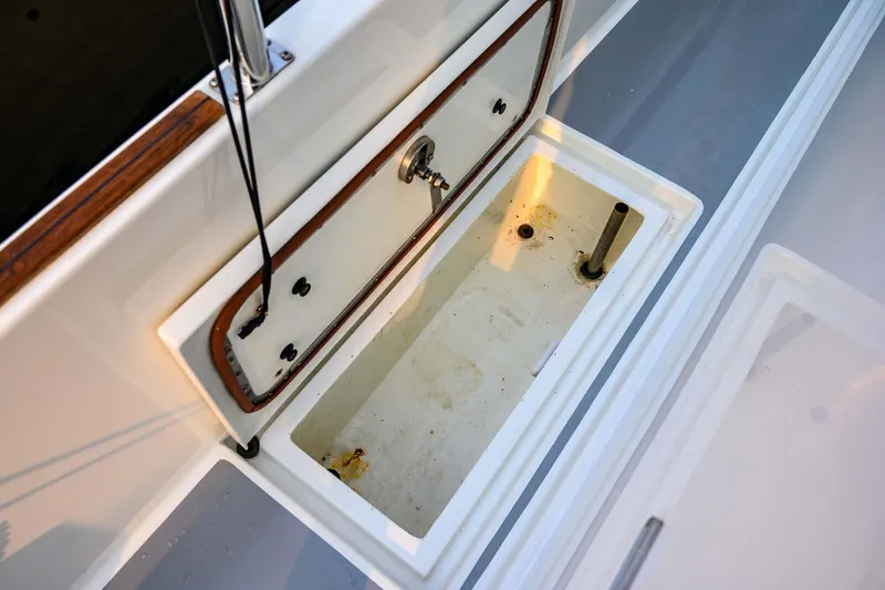  Yacht Photos Pics Open storage compartment on 2019 Targa 35 boat, featuring a clean, white interior.