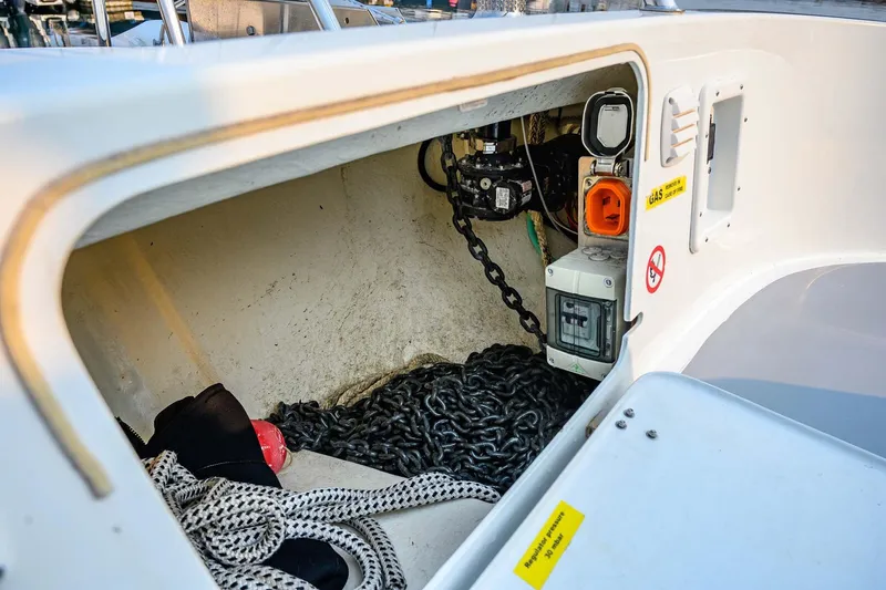  Yacht Photos Pics Storage compartment of a 2019 Targa 35 boat with chains and ropes.