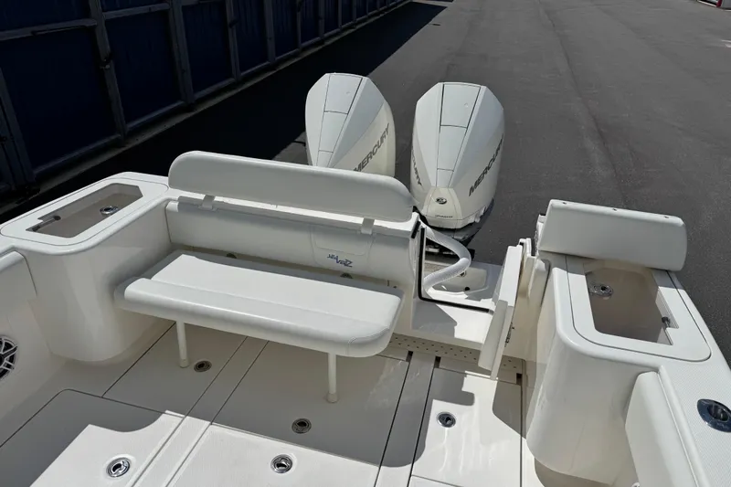  Yacht Photos Pics 2024 SeaVee 32Z boat with dual Mercury engines and spacious seating area.
