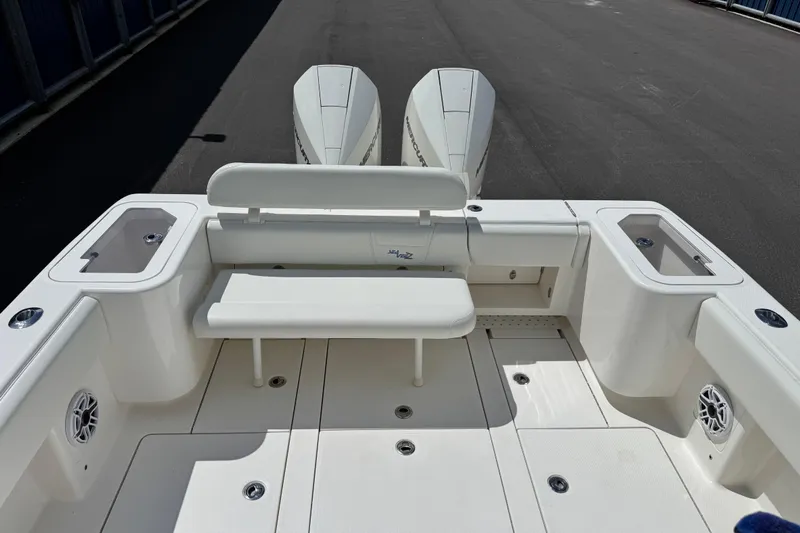  Yacht Photos Pics 2024 SeaVee 32Z boat deck with seating and twin outboard engines.
