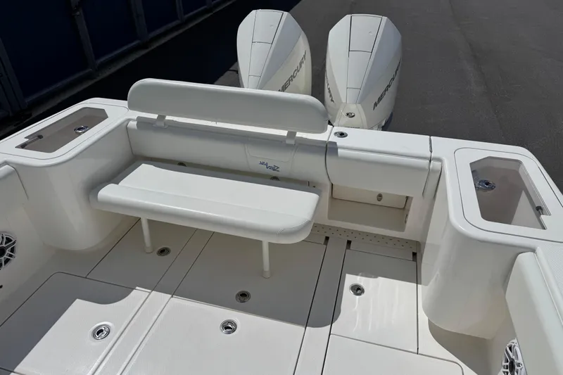  Yacht Photos Pics 2024 SeaVee 32Z boat interior with seating and dual Mercury outboard engines.