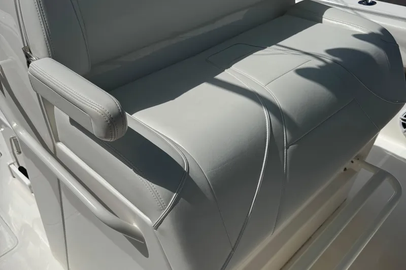  Yacht Photos Pics 2024 SeaVee 32Z boat seat with sleek, modern design and comfortable armrest.