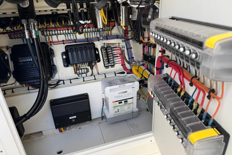  Yacht Photos Pics 2024 SeaVee 32Z electrical system with organized wiring and components.