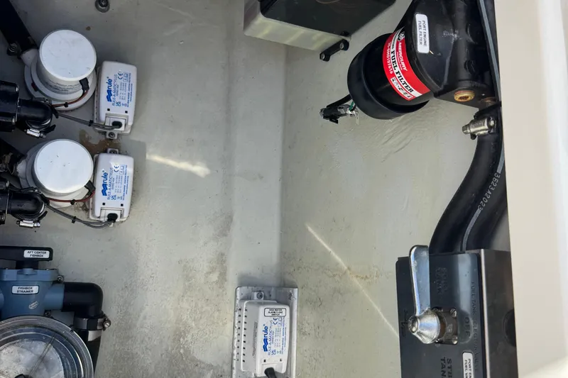  Yacht Photos Pics 2024 SeaVee 32Z boat interior showing pumps and mechanical components.