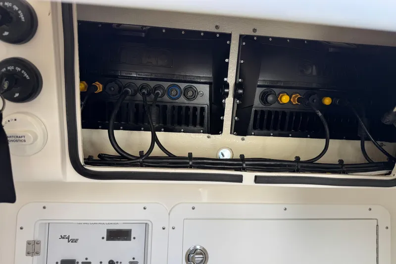  Yacht Photos Pics 2024 SeaVee 32Z boat electronics panel with wiring and diagnostic controls.