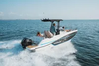 2026 Quicksilver 705 Open boat cruising on open water with passengers.