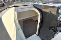 Interior cabin view of 2026 Quicksilver 705 Open boat, featuring sleek design and modern amenities.