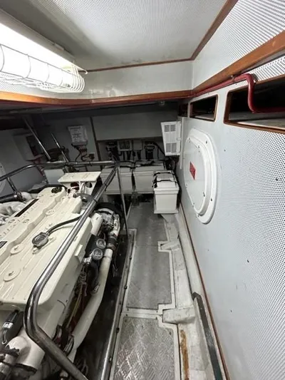 Kairos Yacht Photos Pics Engine room of a 2005 Selene 36 yacht, featuring machinery and equipment.