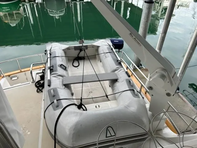 Kairos Yacht Photos Pics Inflatable boat on Selene 36 yacht, 2005 model, docked at marina.