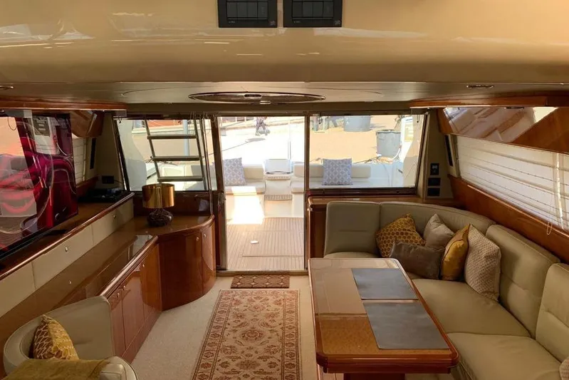  Yacht Photos Pics Luxurious interior of a 2004 Ferretti Yachts 620 with elegant seating and decor.