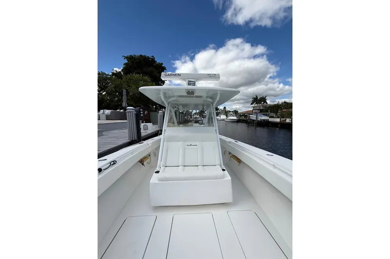  Yacht Photos Pics 2010 SeaHunter 40 boat with Garmin equipment, docked by a scenic waterfront.