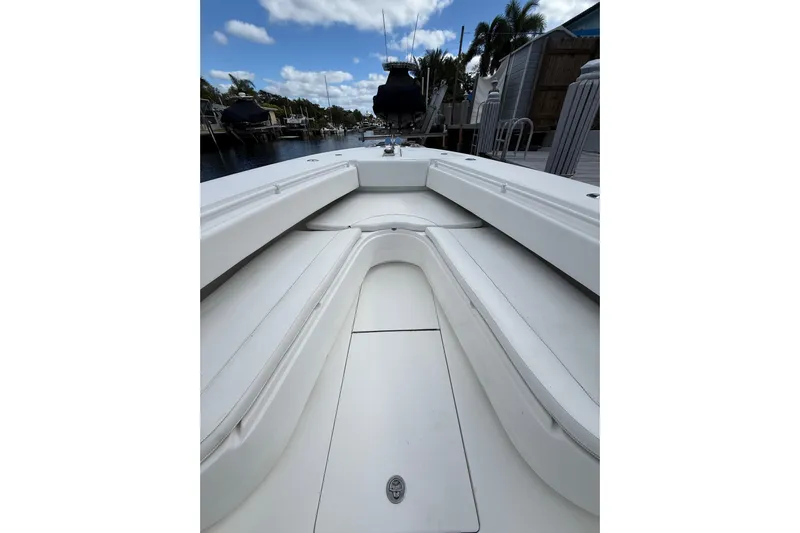  Yacht Photos Pics 2010 SeaHunter 40 boat interior with white seating and clear sky background.