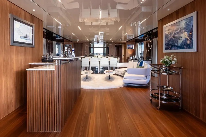 Neverland Yacht Photos Pics Luxurious interior of 2020 Sanlorenzo 44 Alloy yacht with elegant wood paneling and modern furnishings.