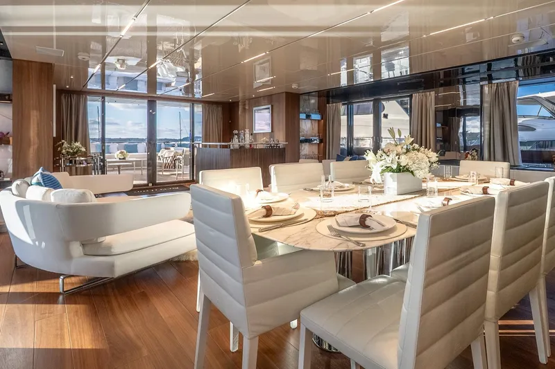 Neverland Yacht Photos Pics Luxurious interior of 2020 Sanlorenzo 44 Alloy yacht with elegant dining area and modern decor.