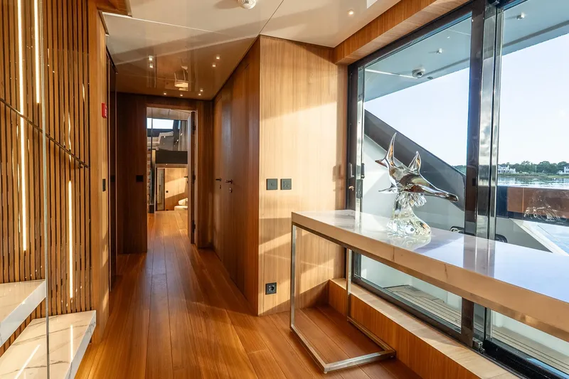 Neverland Yacht Photos Pics Luxurious interior of 2020 Sanlorenzo 44 Alloy yacht with wooden flooring and modern decor.