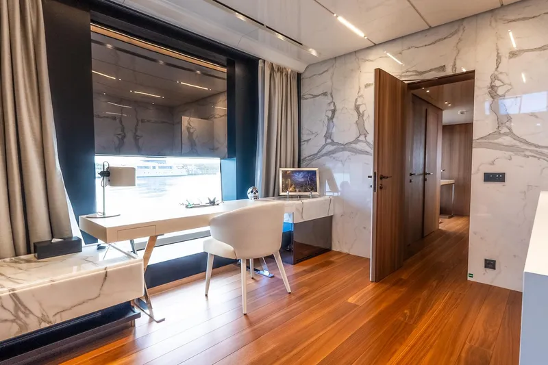 Neverland Yacht Photos Pics Luxurious interior of 2020 Sanlorenzo 44 Alloy yacht with elegant marble and wood finishes.